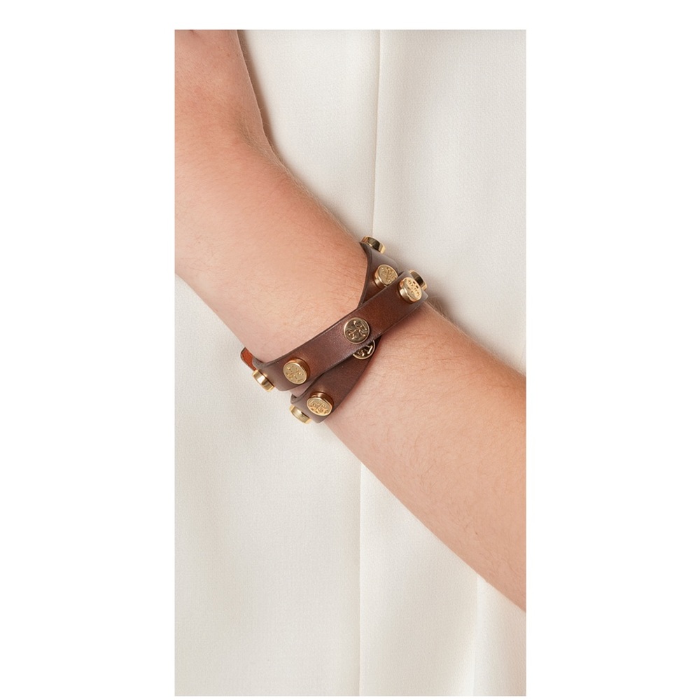 Tory Burch brown leather wrap bracelet with gold logo studs. Never worn.